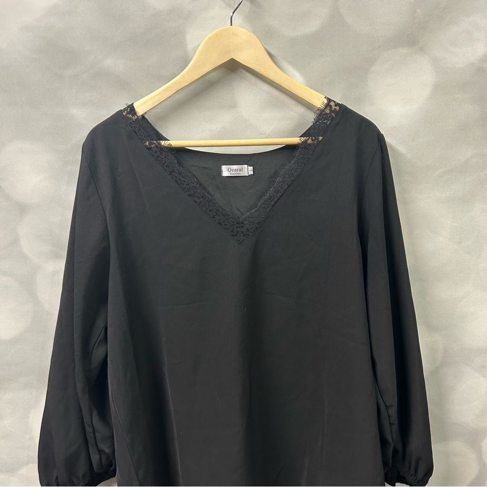 Qearal‎ loose black blouse in size large with elastic cuff and ballooned sleeves
